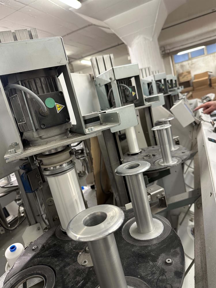 Rows of yarn winding machines
